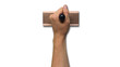 © AdobeLibrary - Hand Holding Large Stamp on White Background