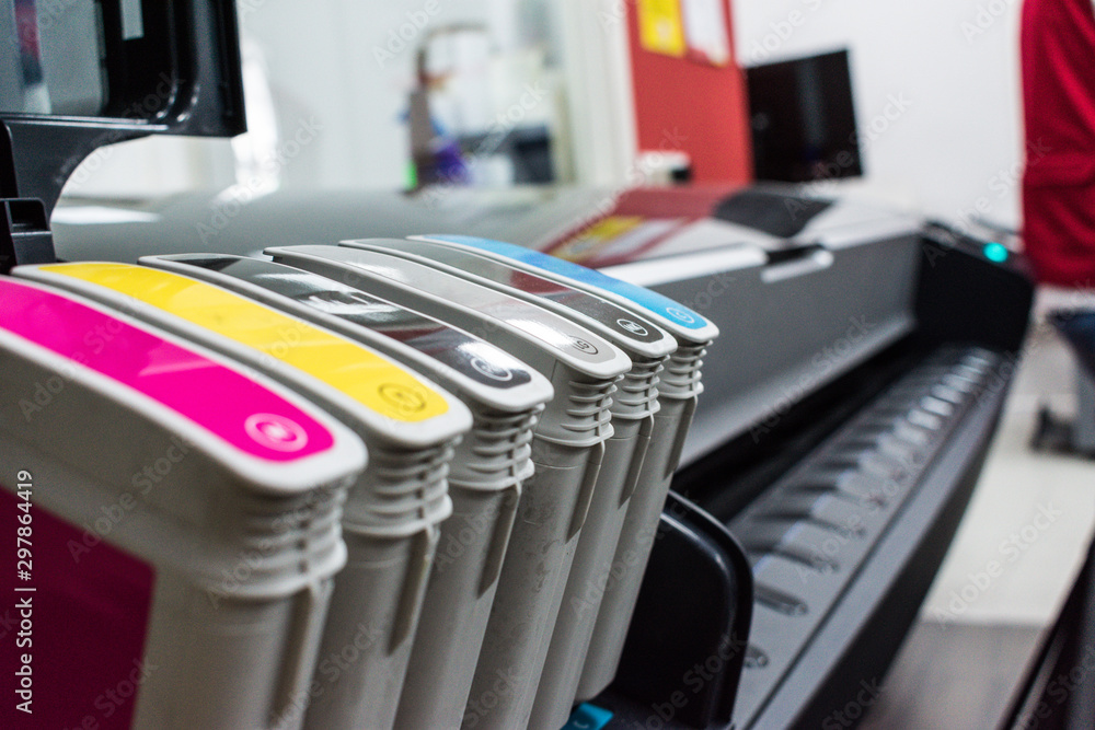 Close detail of ink cartridges in plotter for printing - obrazy, fototapety, plakaty 