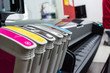 Close detail of ink cartridges in plotter for printing