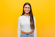 © Asier - Young pretty arab woman against a yellow background happy, smiling and cheerful.