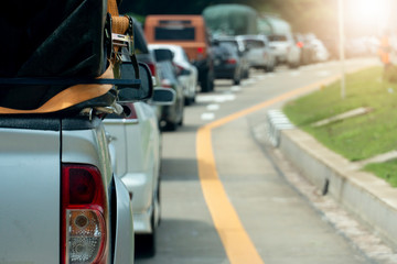 Wall Mural - Cars parked on an asphalt road for long-distance travel or traveling.