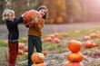 © pikselstock - Two little boys having fun in a pumpkin patch