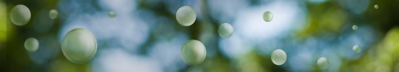 Wall Mural - Image of green stylized balls on a beautiful abstract blurred natural background