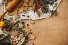 Christmas Gingerbread Cookies On Vintage Plate And Anise, Cinnamon, Pine Cones And Cedar Branches, Rolling Pin On Rustic Table, Flat Lay With Space For Text