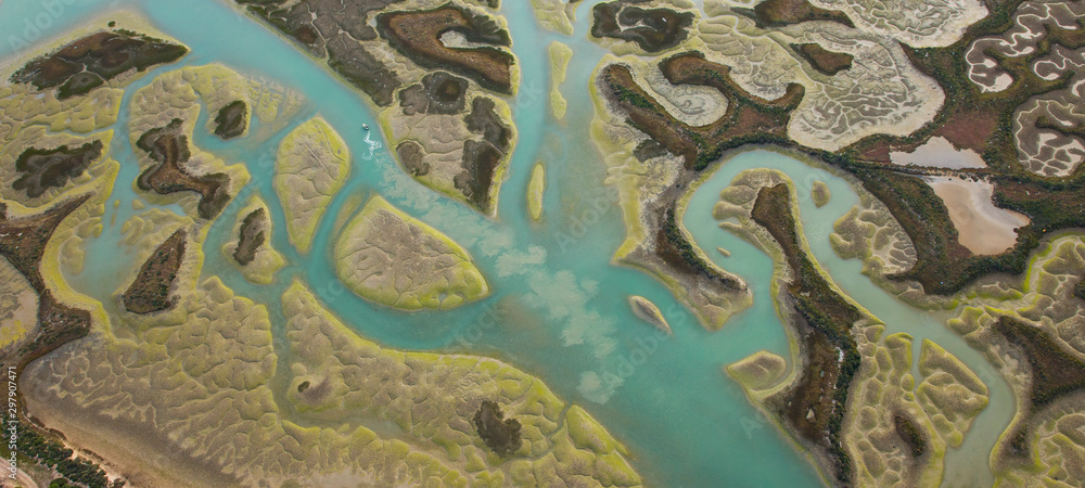 Odiel river, Aerial view, marshlands, Bahia de Cadiz Natural Park. Costa de la Luz, Cadiz province, Andalucia, Spain - obrazy, fototapety, plakaty 