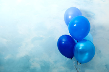 Wall Mural - Bunch of balloons on light blue background, space for text. Greeting card