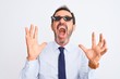 © Krakenimages.com - Middle age businessman wearing thug life sunglasses over isolated white background crazy and mad shouting and yelling with aggressive expression and arms raised. Frustration concept.