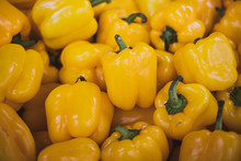 Yellow Bell Peppers On Display At The Market