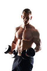 Wall Mural - Strong, fit and sporty bodybuilder man over white background. Sport and fitness.