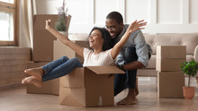 Happy Black Young Couple Have Fun On Moving Day