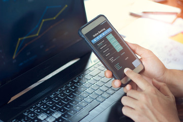 Leinwandbilder - Businessman using mobile smartphone with data information banking network connection on screen, mobile banking and online payment.