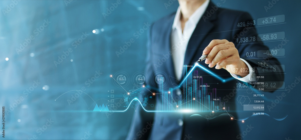 Businessman draw growth graph and progress of business and analyzing financial and investment data ,business planning and strategy on blue background. - obrazy, fototapety, plakaty 