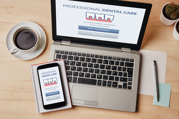 Dental care concept on laptop and smartphone screen