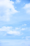 Fototapeta Boho - Pastel blue sky with light clouds
