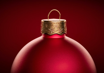 red christmas ball close-up against dark red background