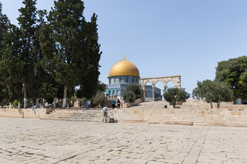 Dome of the Rock and gate leading to the dome on the territory of the interior of the Temple Mount in the Old City in Jerusalem, Israel