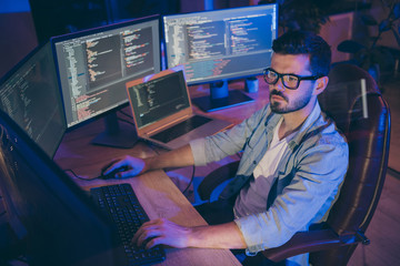 portrait of his he nice attractive focused brunette guy creating script coding java html mysql datab