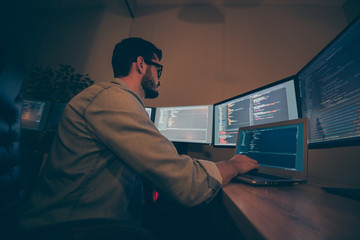 low below angle view photo of it-specialist developing c code improving system of cyber security of 