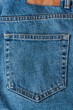 Beautiful textile blue jeans with pocket close up