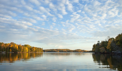 Panorama of a lake in northern Minnesota on a bright morning during autumn