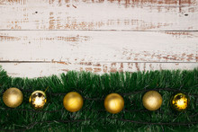 Christmas Decoration On The Table With Gold Ornaments 