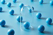 © 365mm/Stocksy - Layout of blue balls with one under cap