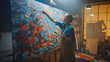 © Gorodenkoff - Talented Female Artist Works on Abstract Oil Painting, Using Paint Brush She Creates Modern Masterpiece. Dark and Messy Creative Studio where Large Canvas Stands on Easel Illuminated