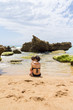 © ACALU Studio/Stocksy - Mother with her son on the beach