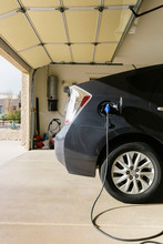 Electric Car Charging In Garage
