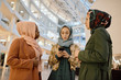 © Clique Images/Stocksy - Three Contemporary Muslim Women in Business Center