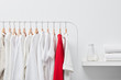 © 365mm/Stocksy - One red shirt among white clothes