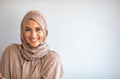 Modern, Stylish and Happy Muslim Woman Wearing a Headscarf. Arab saudi emirates woman covered with beige scarf. 