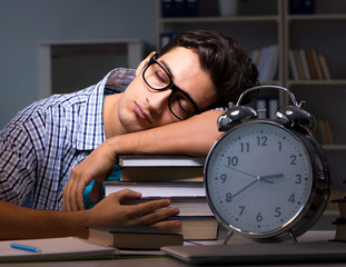 Student preparing for exams late night at home