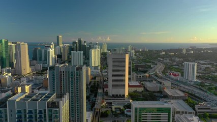 Wall Mural - Flying over Downtown Miami urban city landscape