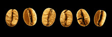 Six Golden Coffee Beans Isolated On A Black Background.