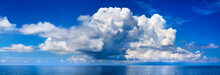 White Cumulus Clouds In Blue Sky Over Sea Landscape, Big Cloud Above Ocean Water Panorama, Horizon, Beautiful Tropical Sunny Summer Day Seascape Panoramic View, Cloudy Weather, Cloudscape, Copy Space