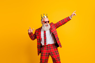 Portrait of his he nice handsome attractive rich wealthy funky gray-haired man dancing having fun time amusement isolated over bright vivid shine vibrant yellow color background