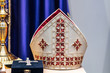Mitre or miter, traditional ceremonial head-dress of bishops and certain abbots in traditional Christianity