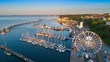 © Konrad Kerker - Sassnitz - miasto, kurort i port nad morzem bałtyckim na wyspie rugia widok na port o wschodzie słońca