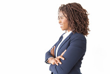 Happy Successful Female Professional Looking At Copy Space Away. Young African American Business Woman With Arms Crossed Standing Isolated Over White Background. Advertising Concept