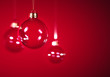 © Martin Piechotta - Glass christmas balls hanging in front of dark grey background