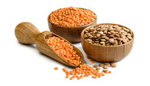 Lentils In A Wooden Bowls And Scoop Isolated On White Background. Full Depth Of Field
