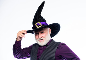 Wall Mural - mature man magician in witch hat. bearded man ready for halloween party. evil wizard. Stargazer or astrologer. halloween holiday costume. happy halloween. Scare You Silly