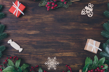 Wall Mural - Arrangement fir festive concept. Top overhead high angle view photo of beautiful traditional stylish trendy colorful newyear decor and place for advert in the center of table