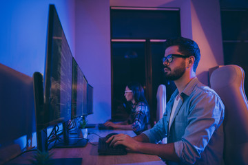 Profile photo of it specialist two guy lady business people together sitting late night chairs watch monitors modify system writing interface front-end code office indoors