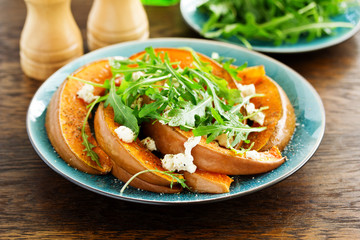 Canvas Print - Baked pumpkin with feta and herbs. Selective focus