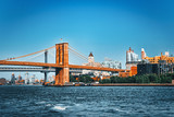Fototapeta Sypialnia - Suspended Brooklyn Bridge across Lower Manhattan and Brooklyn. New York, USA.