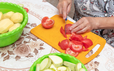 Woman slices a knife with a knife