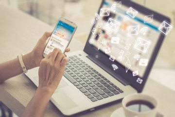 woman hand using phone with email icon, email concept