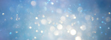 Abstract Glitter Silver, Gold , Blue Lights Background. De-focused. Banner